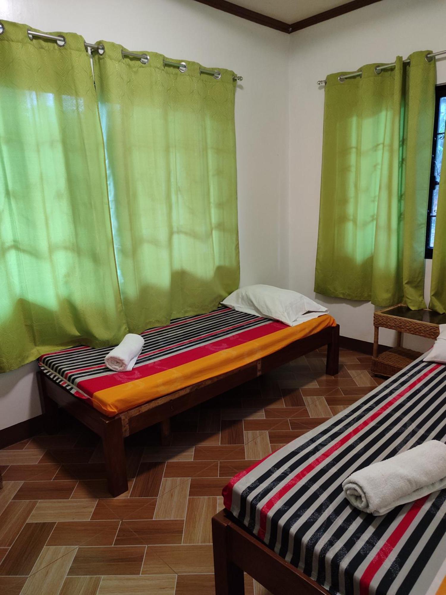 E&N Paradise Island Resort Siquijor Habitación foto